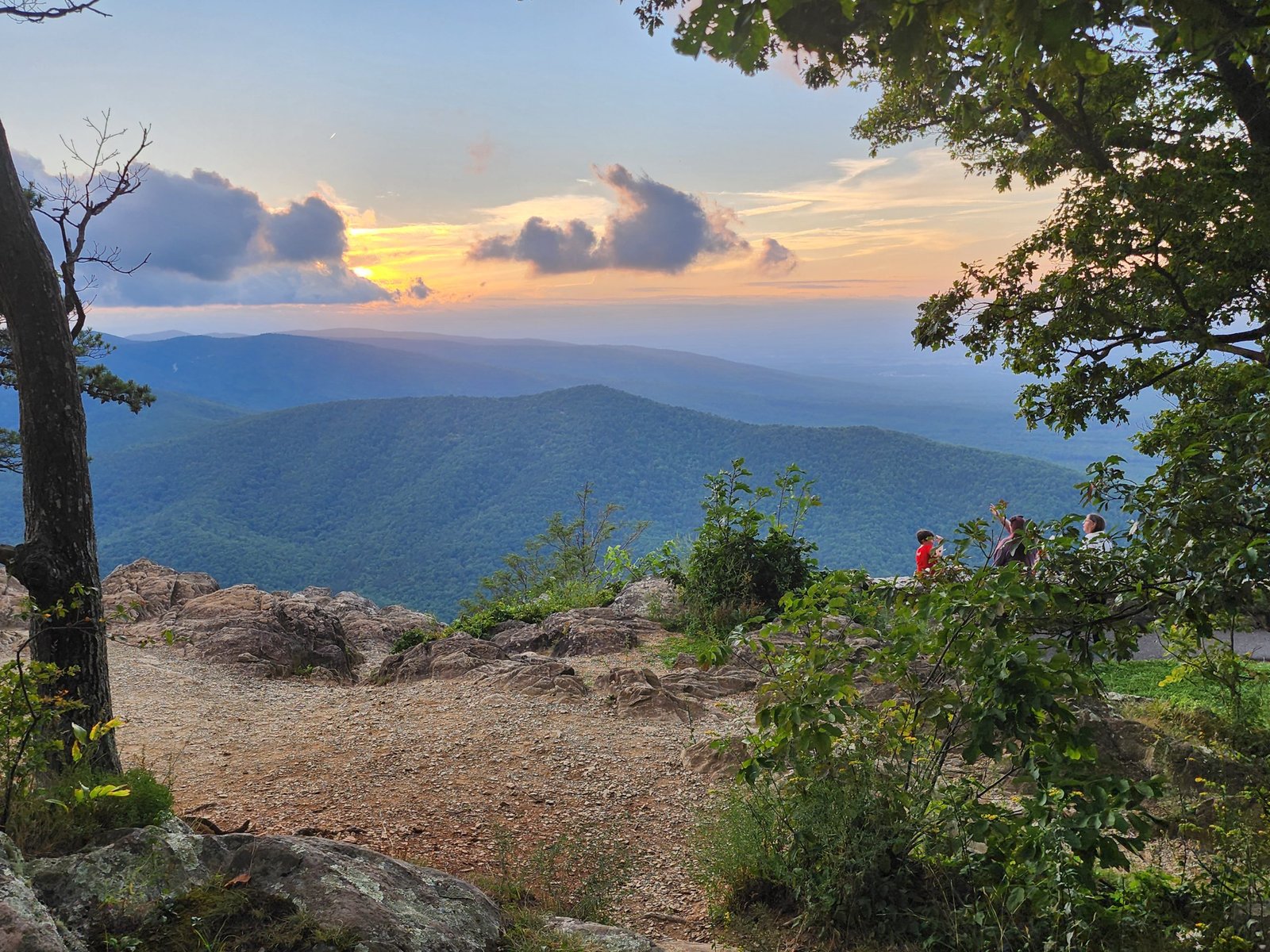 Mountain overlook at dusk, looking out over a valley
